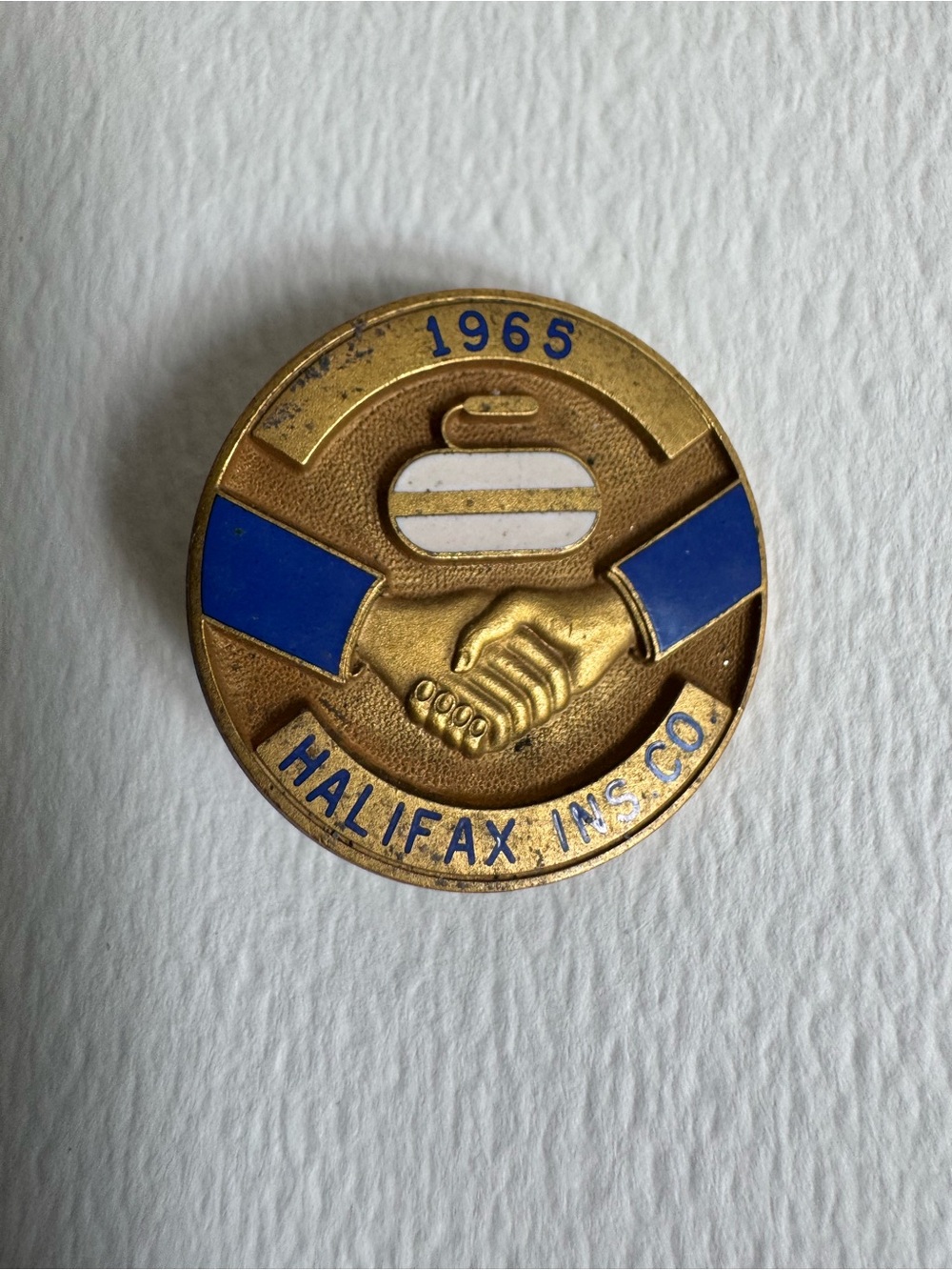 Halifax Ins. Co. 1965 Brass Blue Enamel Curling Pin